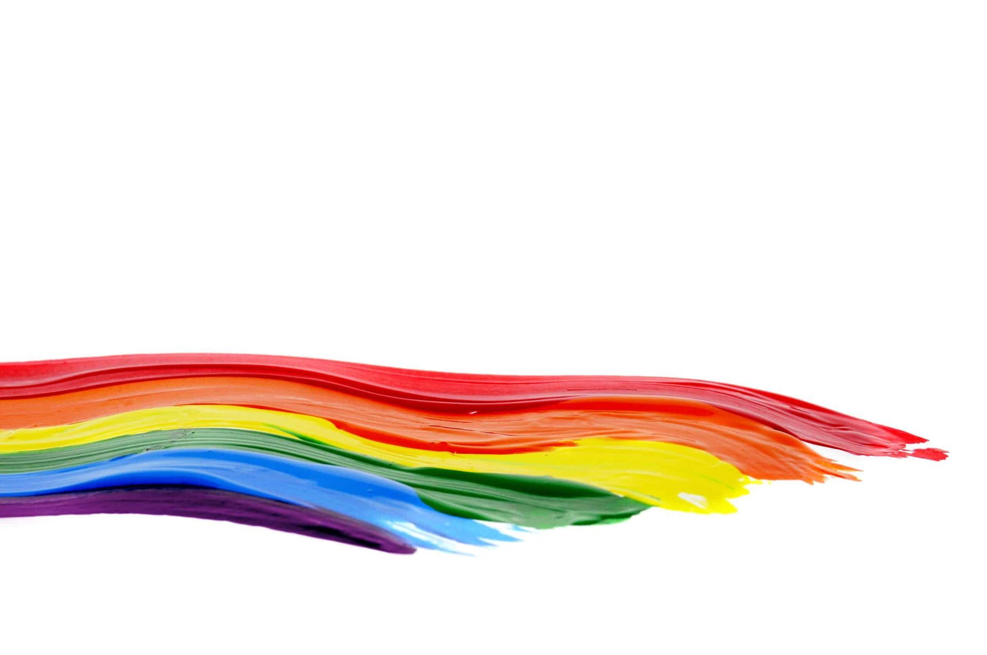 Rainbow-colored paint strokes across the bottom, against a white background.