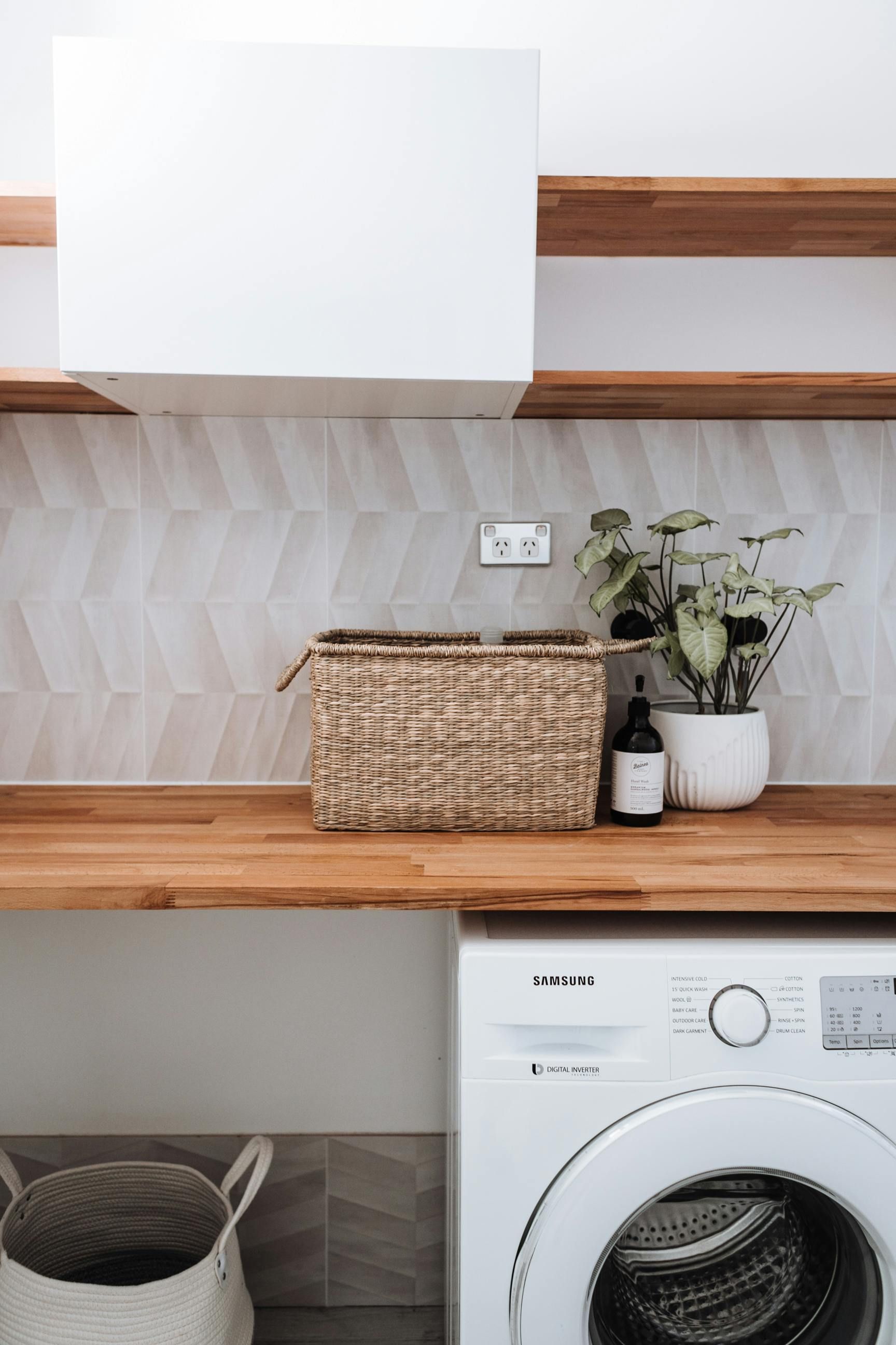 Laundry Room with White Washer, Wooden Shelves, Woven Basket — Rivbuild In Uranquinty, NSW