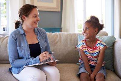 Behavioral Services — Psychologist Talking with a Young Girl in Richmond, VA