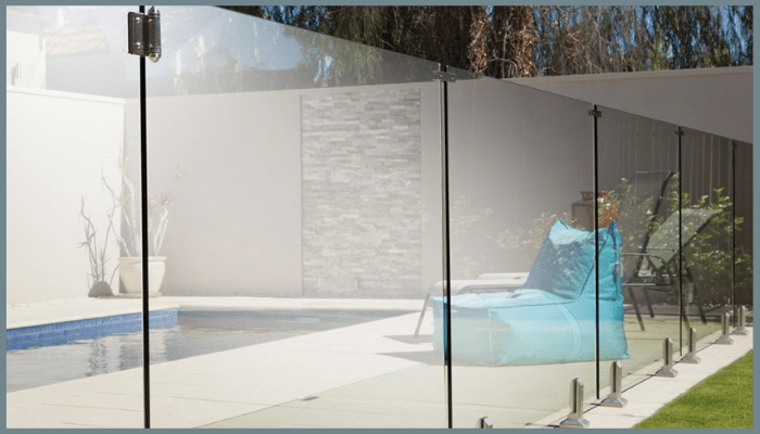 Frameless glass pool fencing installed to meet ACT safety regulations