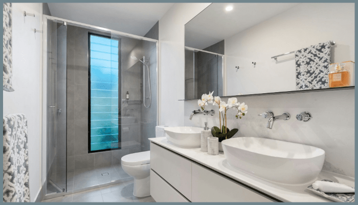 Modern family-friendly bathroom with a walk-in shower and safe design for all ages.