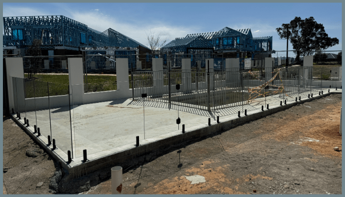 Frameless glass pool fencing installation at a residential property in Canberra.