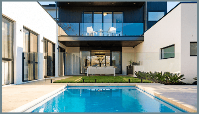 Frameless glass pool fencing in a modern Canberra home showcasing unobstructed views, child safety, and contemporary architectural style.