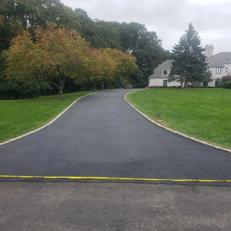 Photo of blacktop paved driveway  by Asphalt Direct Paving, Morris County, New Jersey.