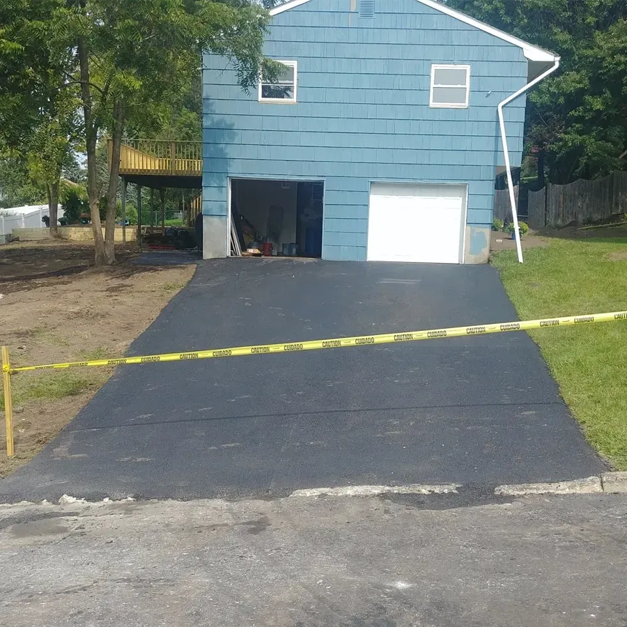 Photo of blacktop paved driveway  by Asphalt Direct Paving, Morris County, New Jersey.