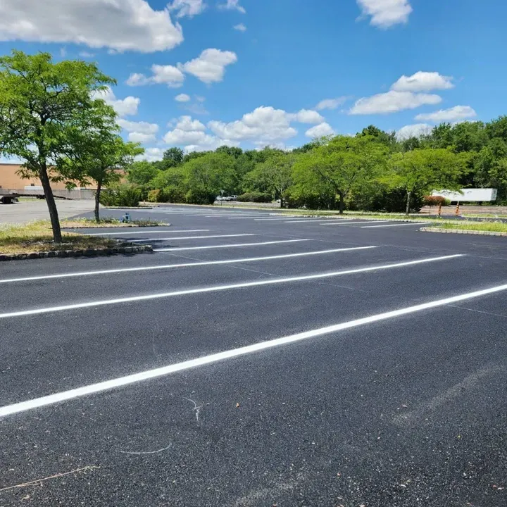 Photo of blacktop pavement with line striping of a parking lot by Asphalt Direct Paving, Morris County, New Jersey.