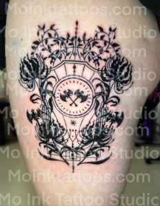 Black floral ornamental tattoo design with a central vintage clock on a light background