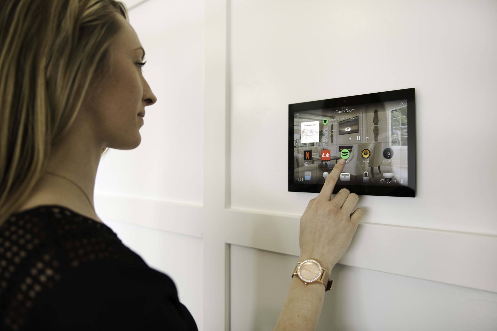 smart home automation - woman using touch screen
