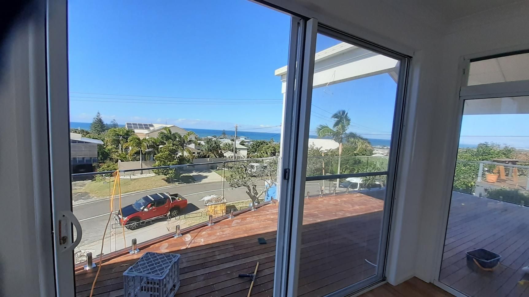 A Room with A Sliding Glass Door and A View of The Ocean — Nano2go in Birtinya, QLD