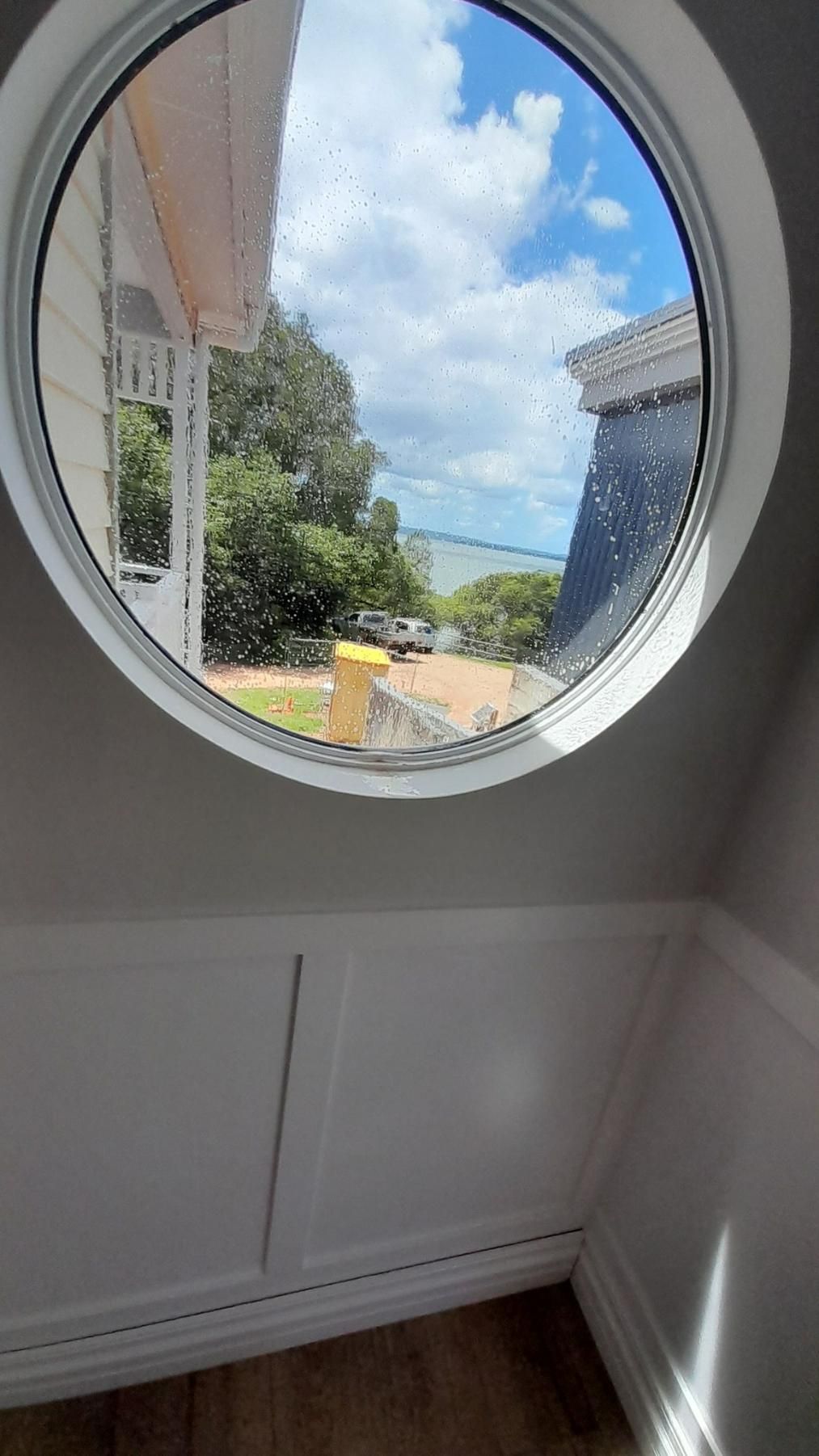 A Round Window in A Room with A View of A House — Nano2go in Birtinya, QLD