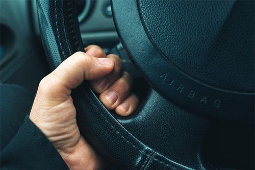 Car Steering Wheel with Airbag Sign — Corpus Christi, TX — Advantage Salvage & Auto Parts LLC