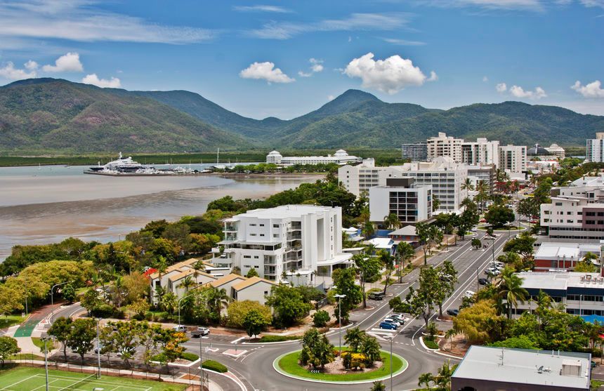 An Aerial View Of A City With Mountains In The Background — Queensland Lawyers Cairns In Cairns City, QLD