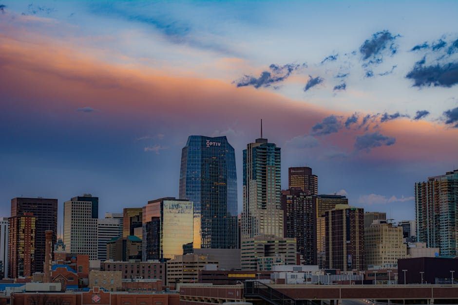 Denver cityscape at sunset - denver co plumbing company