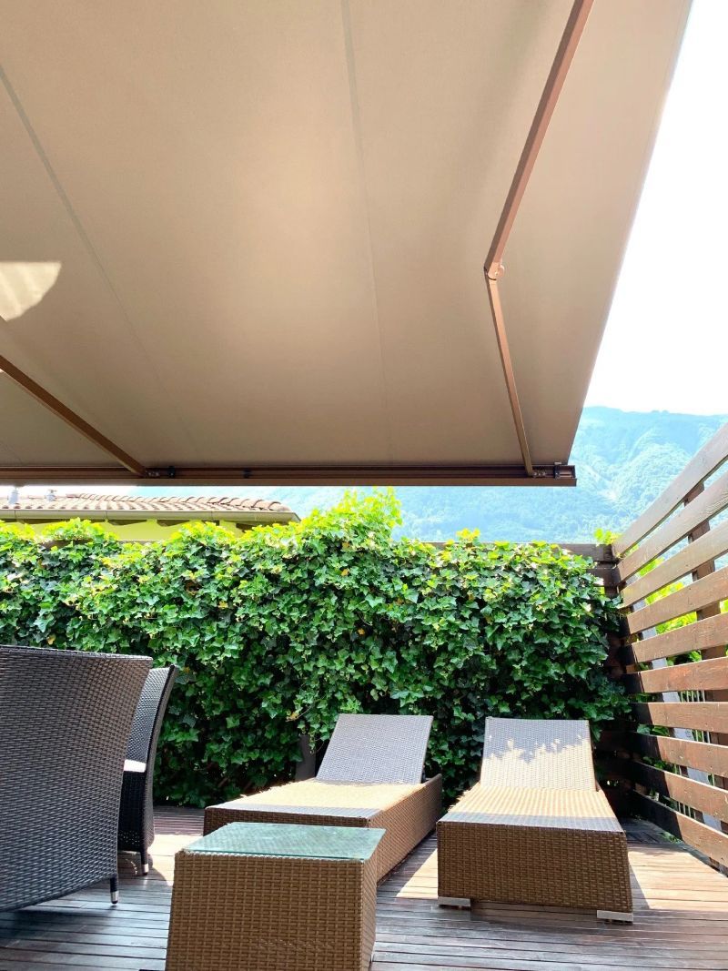 Tenda a bracci Segno a motore