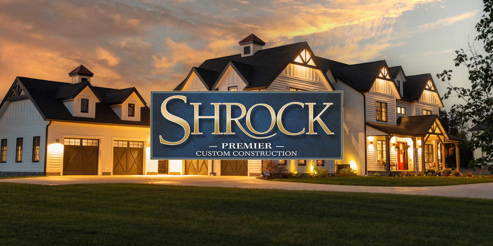 A large custom home with the Shrock Premier Custom Construction logo in the foreground. 