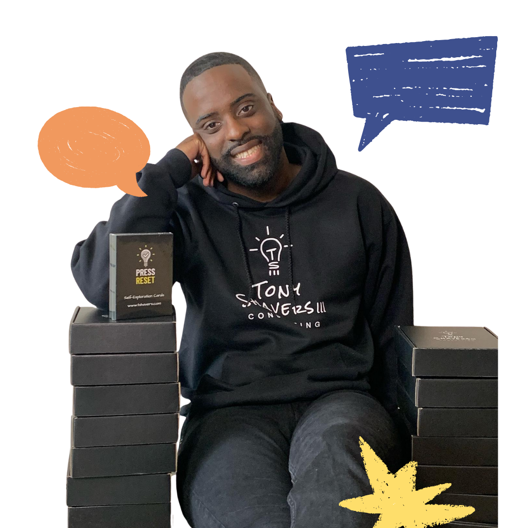 Tony Shavers III in black hoodie smiles, leaning on boxes. Speech bubbles and a star burst accent the image.