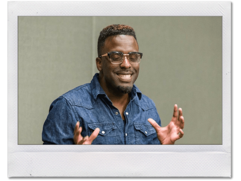 Personal development coach Tony Shavers III speaking to workshop audience