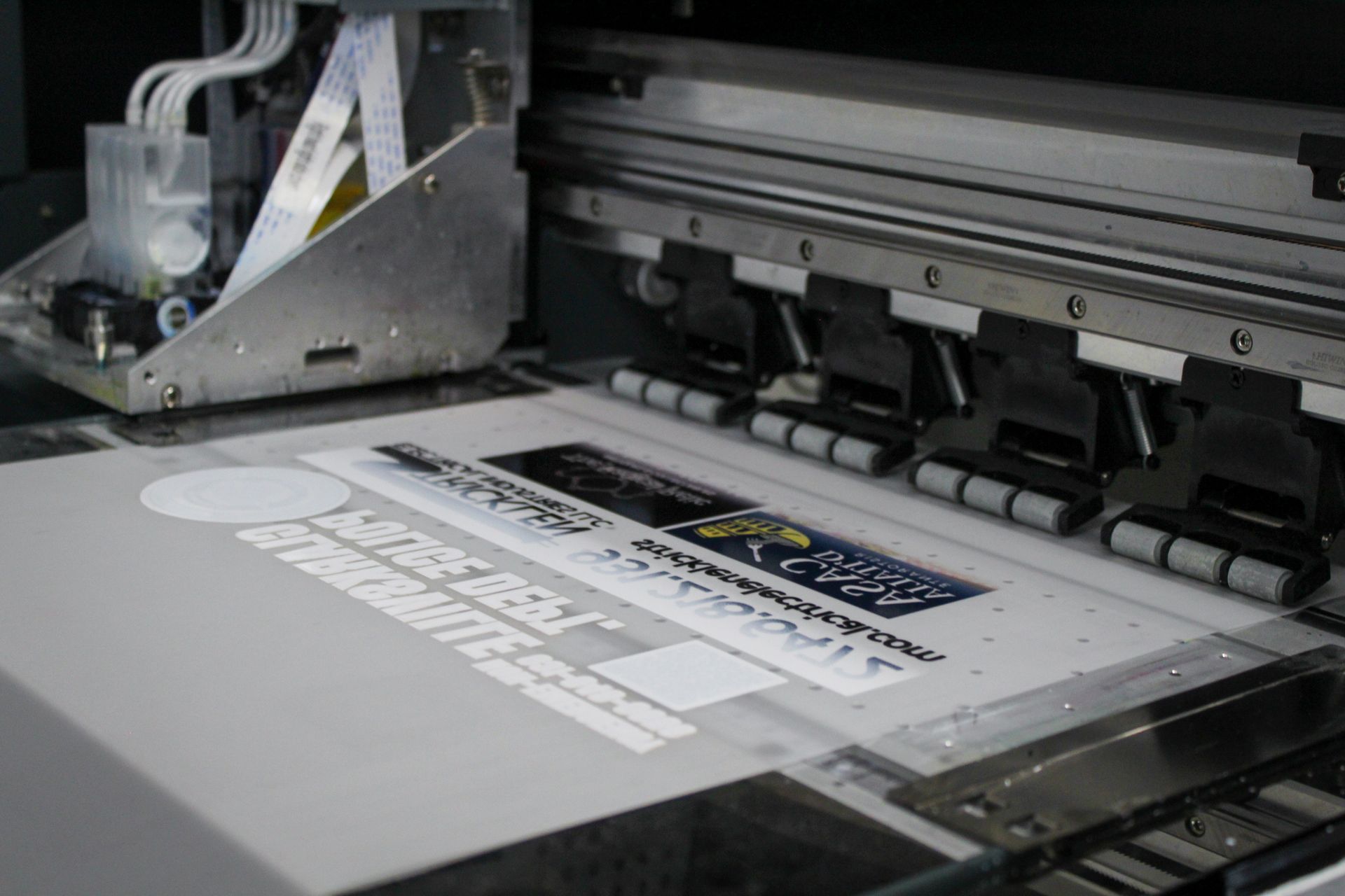 printer actively printing on film for a transfer