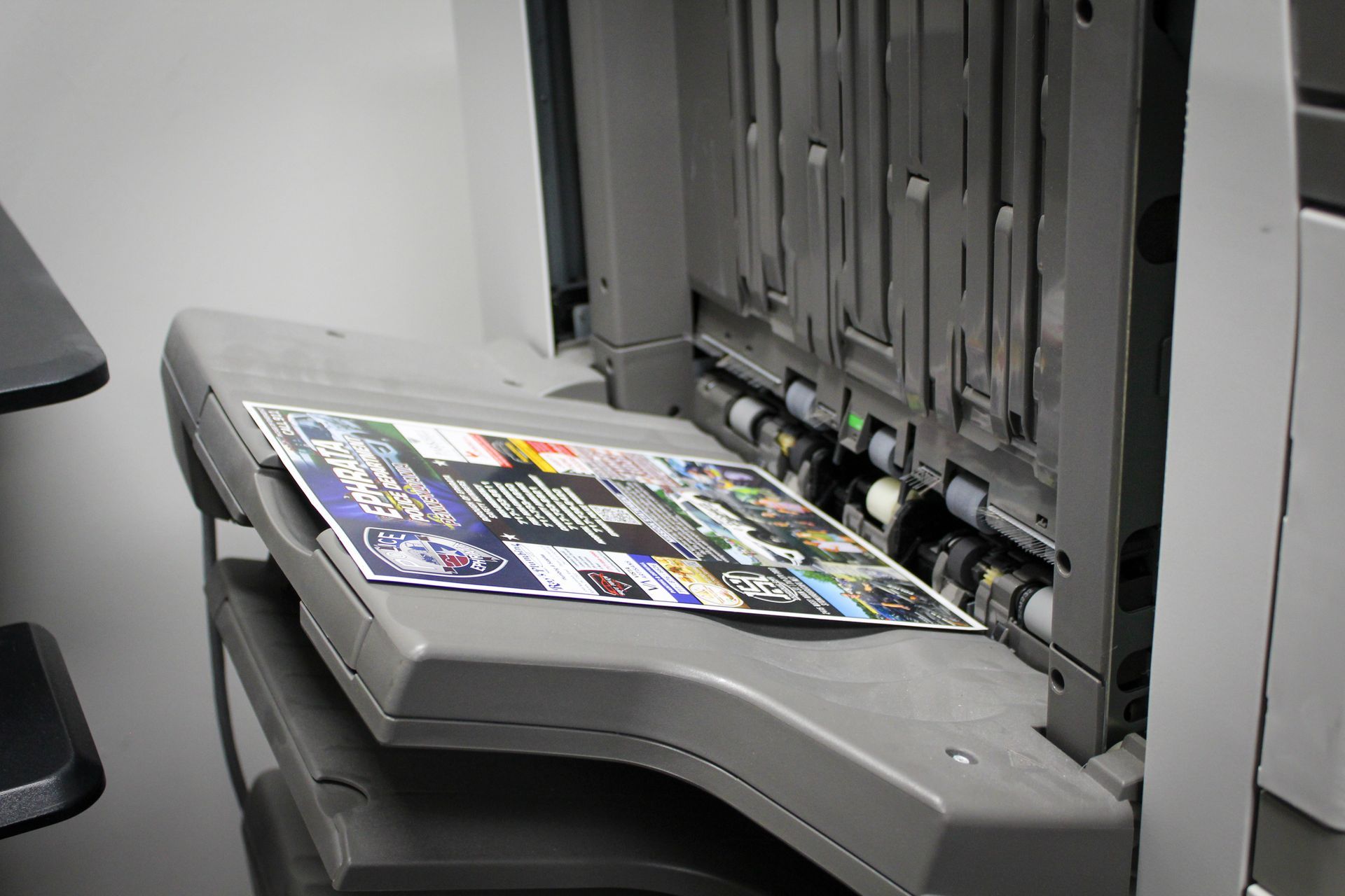 printer actively printing a magnet for a department
