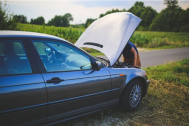 Picture of a car broken down with the hood up and needs Coquitlam Towing Services.