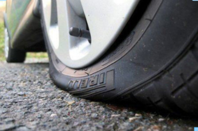 Picture of a flat tire.