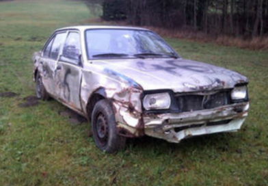 Picture of a scrap metal car.