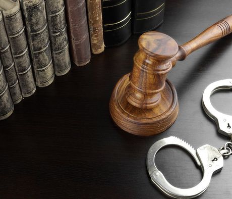 Judges Gavel, Handcuffs And Old Books — Pocatello, ID — Debbie’s Bail Bonds