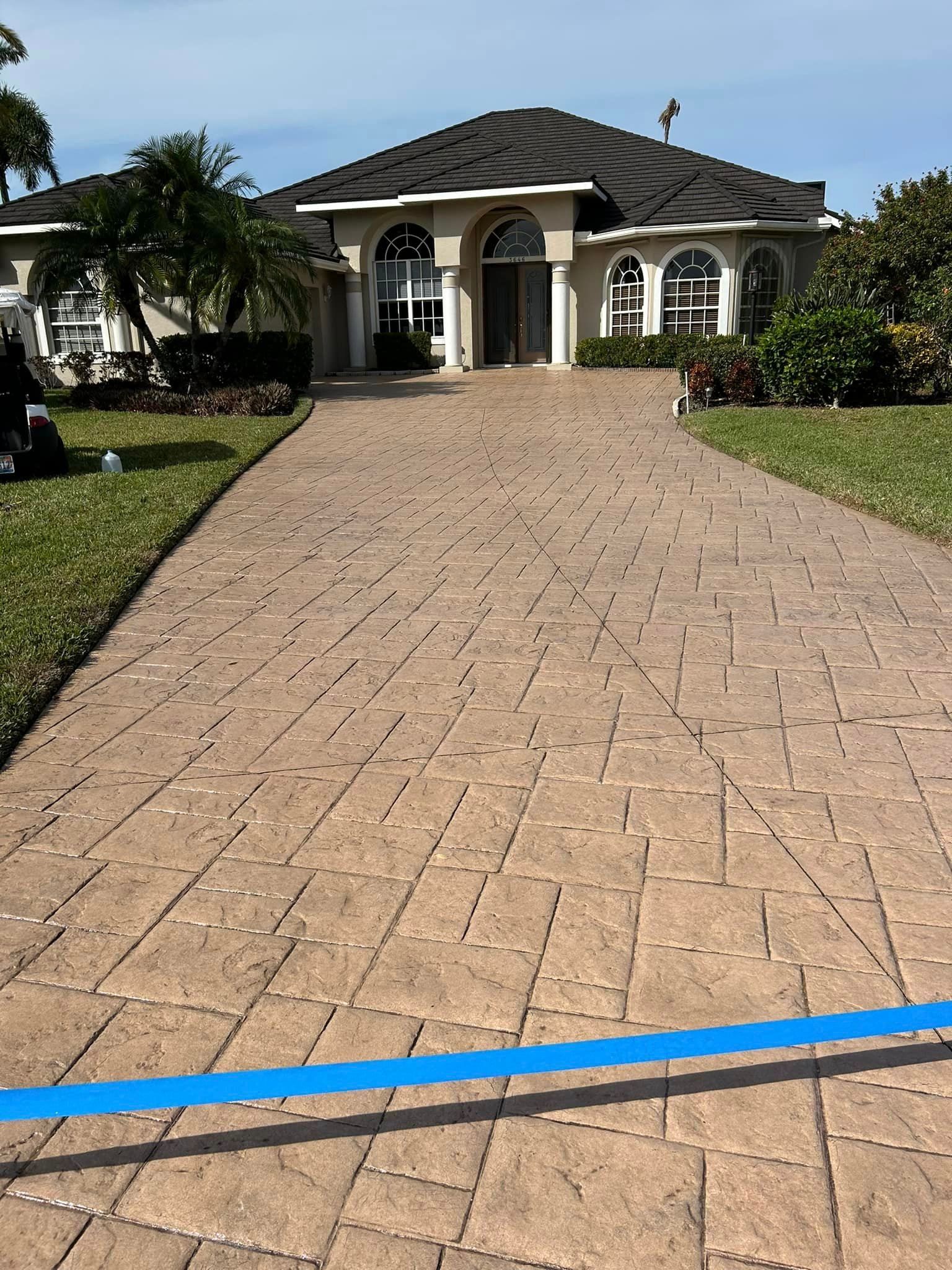 Sealed paver driveway installation