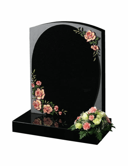 All polished black granite headstone with striking rambling rose design.