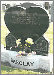 This large heart shaped memorial in Black granite sits on a heavy base with room for surname on the front.