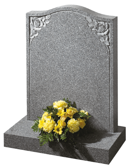 This ogee top memorial in South African dark Grey granite has a honed finish and a deep cut floral border design.
