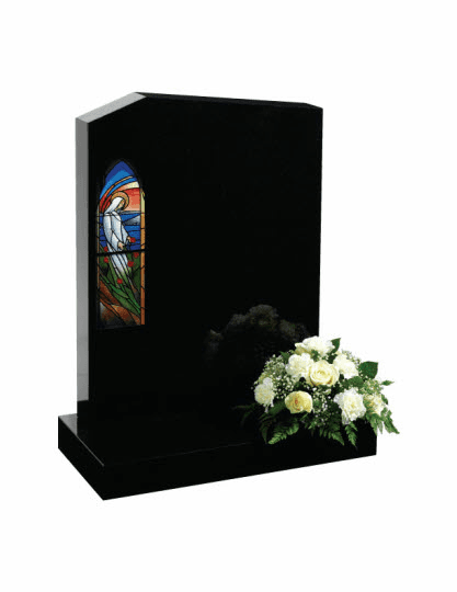 Off-set peon top Black granite memorial with stain glass inspired ornamentation.