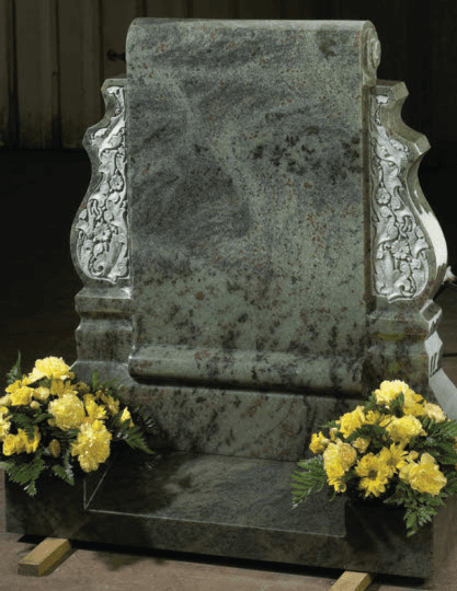 An imposing Imperial Green granite design influenced by traditional memorials.