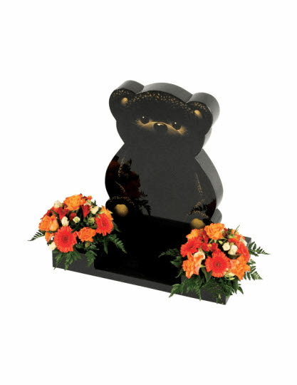 Subtle features enhance this teddy bear shaped memorial. The base has a centre splay adding extra inscription space.