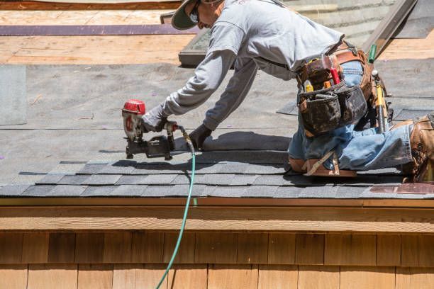 Builder Working On Roof Of New Building — Rockledge, FL — Local Roofing Experts