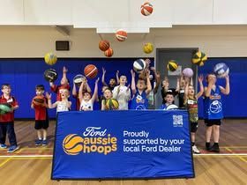 Aussie Hoops group throwing balls up