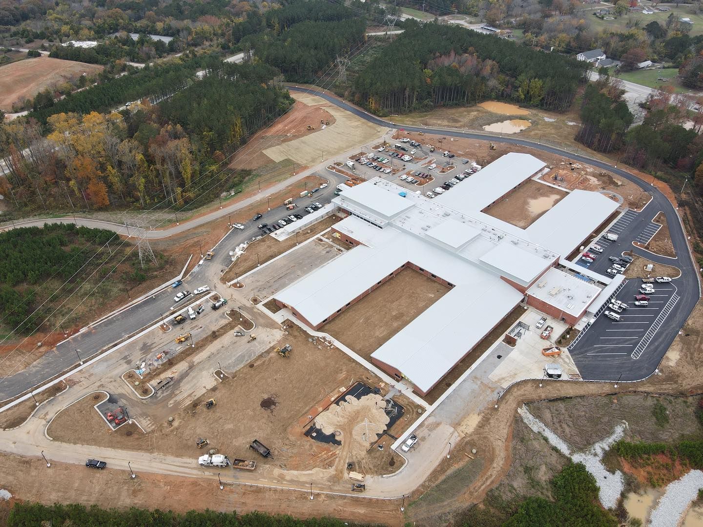 An aerial view of a large building under construction