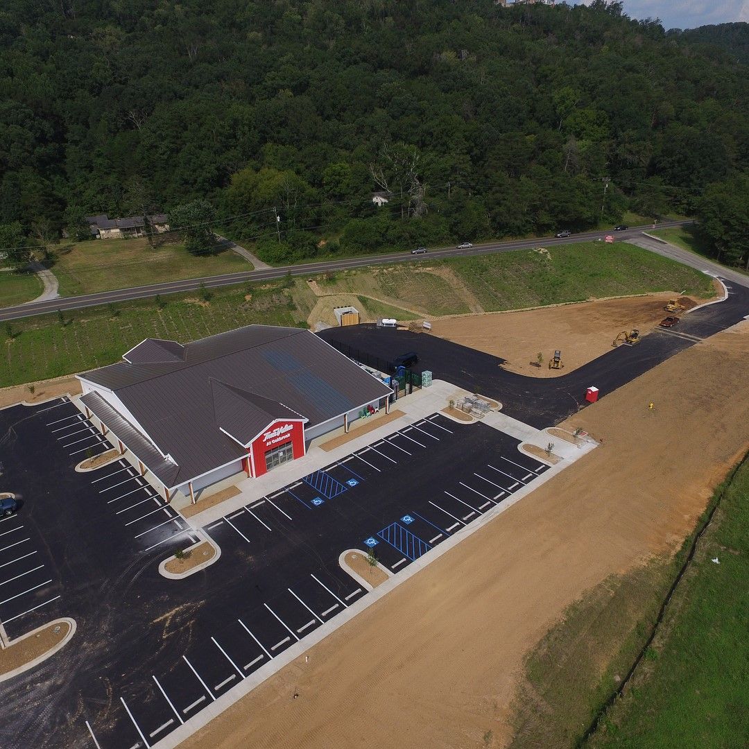 An aerial view of a building and parking lot