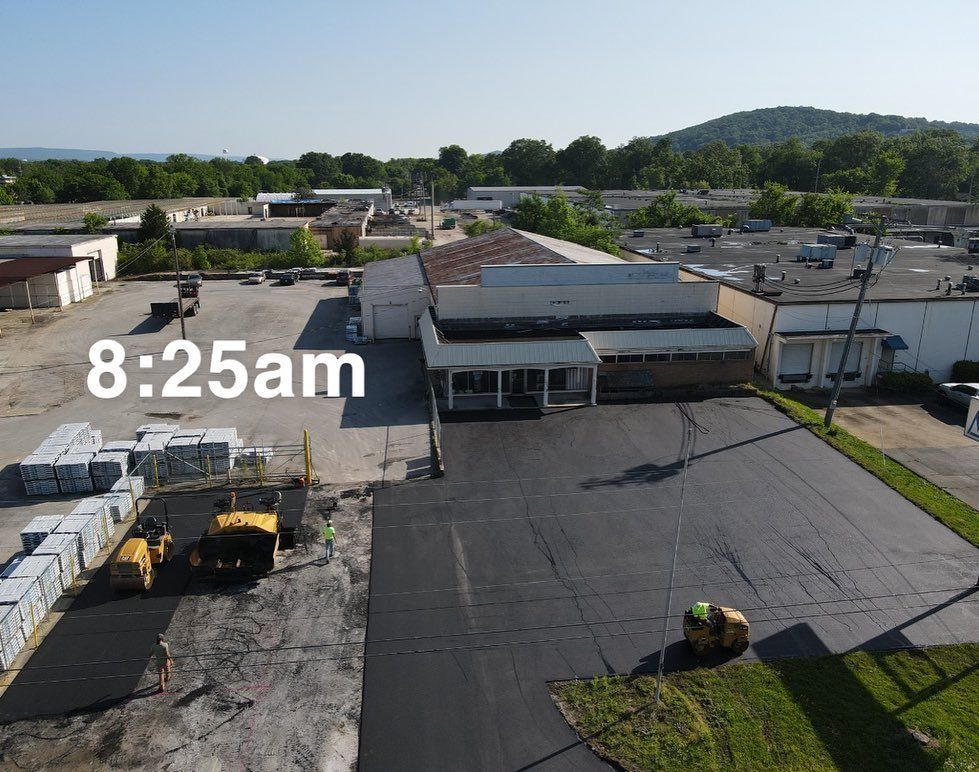 An aerial view of a building with the time of 8:25 am