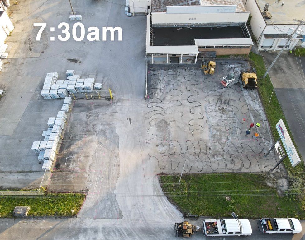 An aerial view of a parking lot at 7:30 am