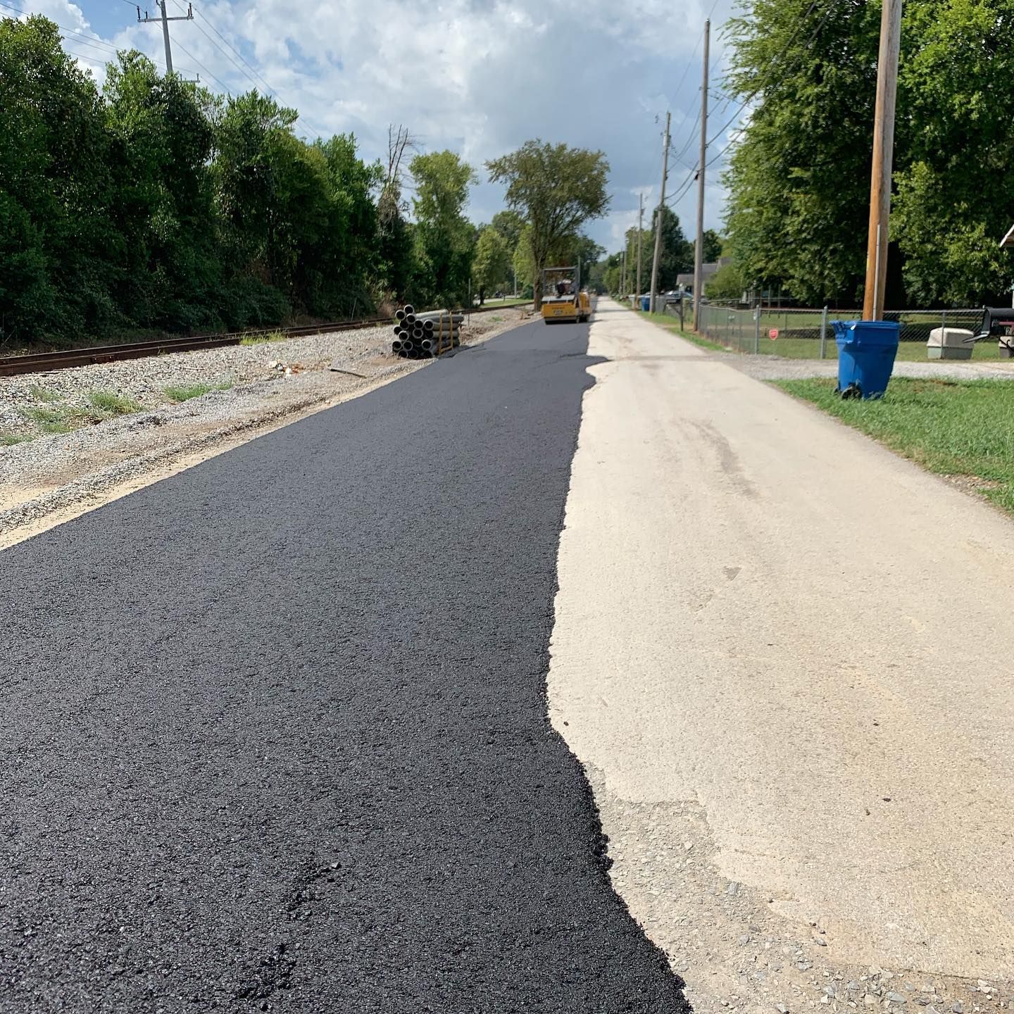 A road that is half black and half white