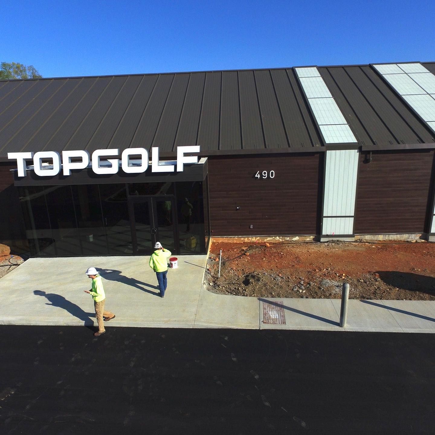 An aerial view of the topgolf building