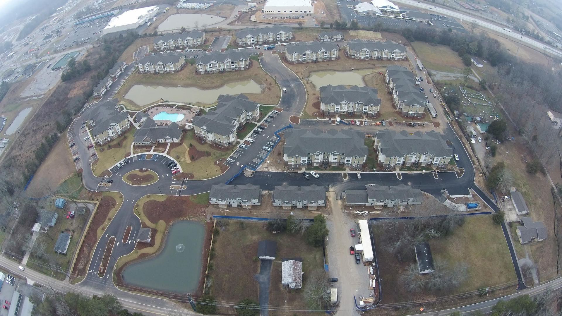An aerial view of a large residential area with lots of buildings