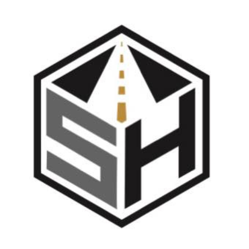 A hexagon with the letter sh inside of it.