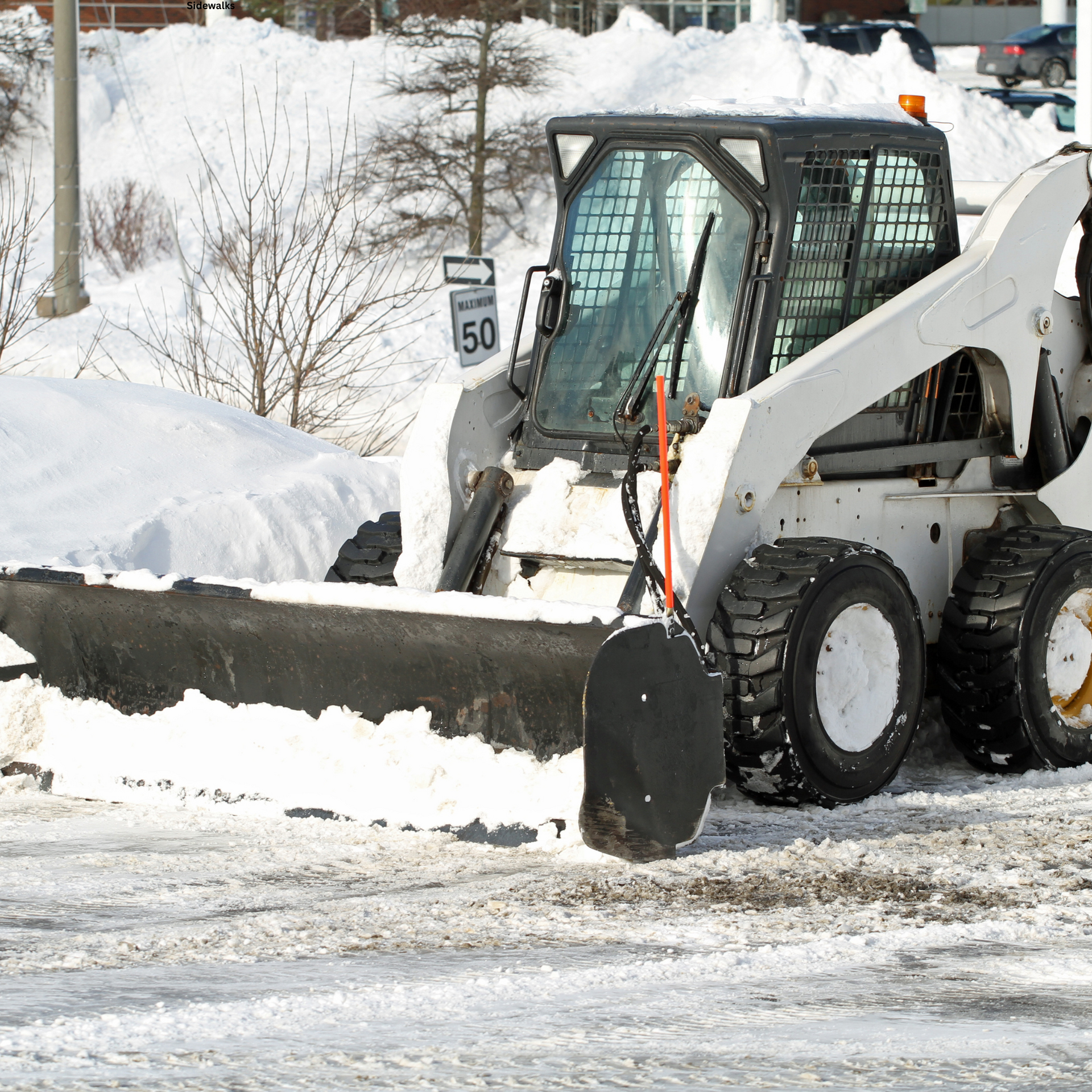 Commercial sidewalk and parking lot snow removal 