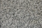 A close up of a gray carpet texture.