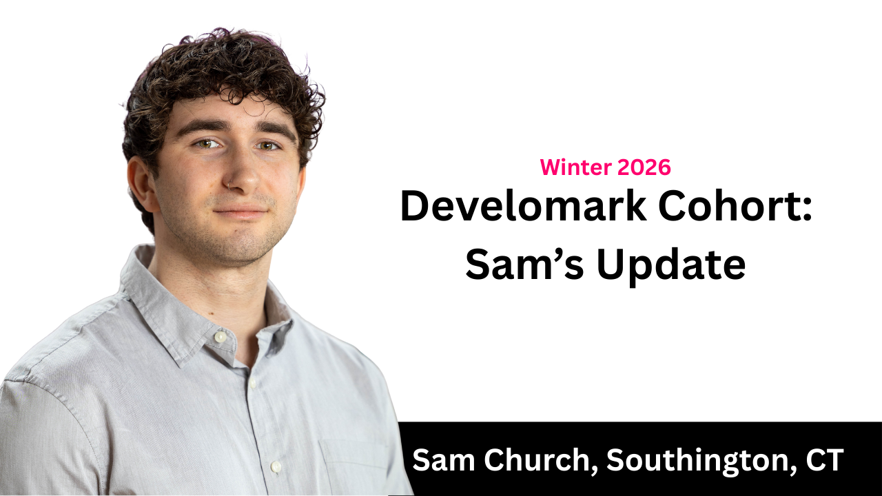 A spotlight shines in a dark, empty room, illuminating the floor and creating shadows.