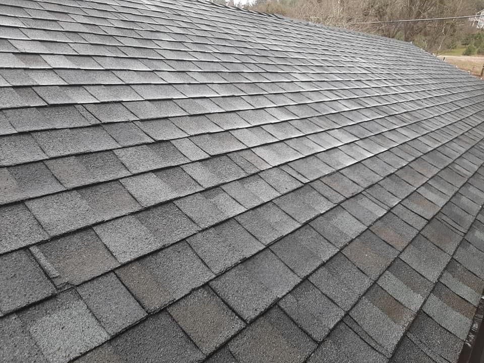 Pressure Pros Soft Washing LLC |  a close up of a roof with a lot of shingles on it.