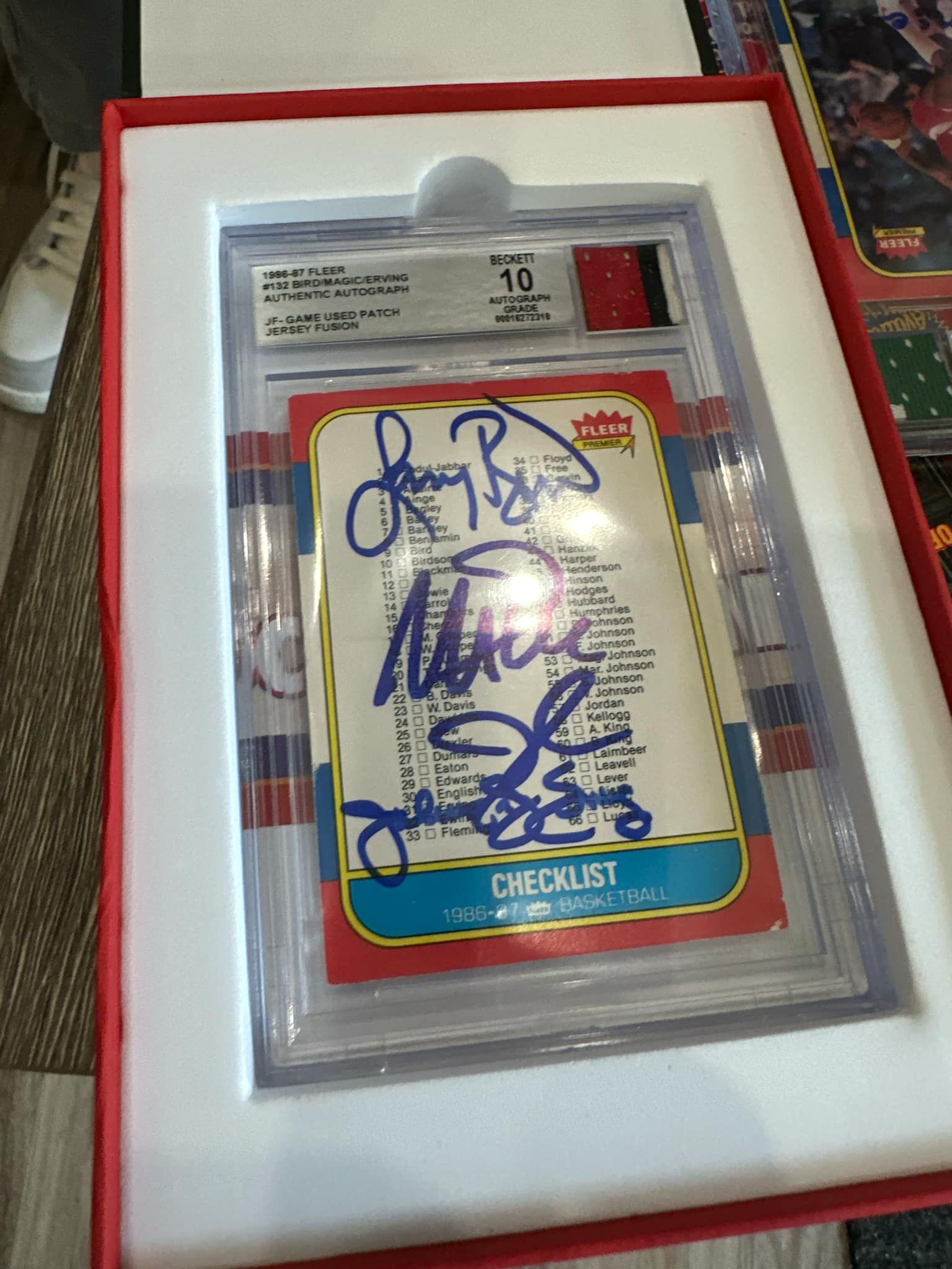 A signed checklist card is in a red box