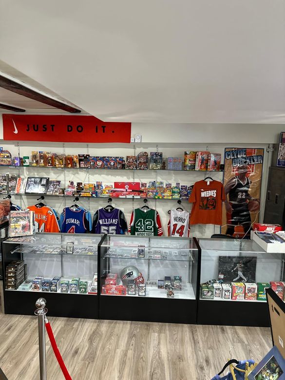 A store filled with lots of shirts and toys.